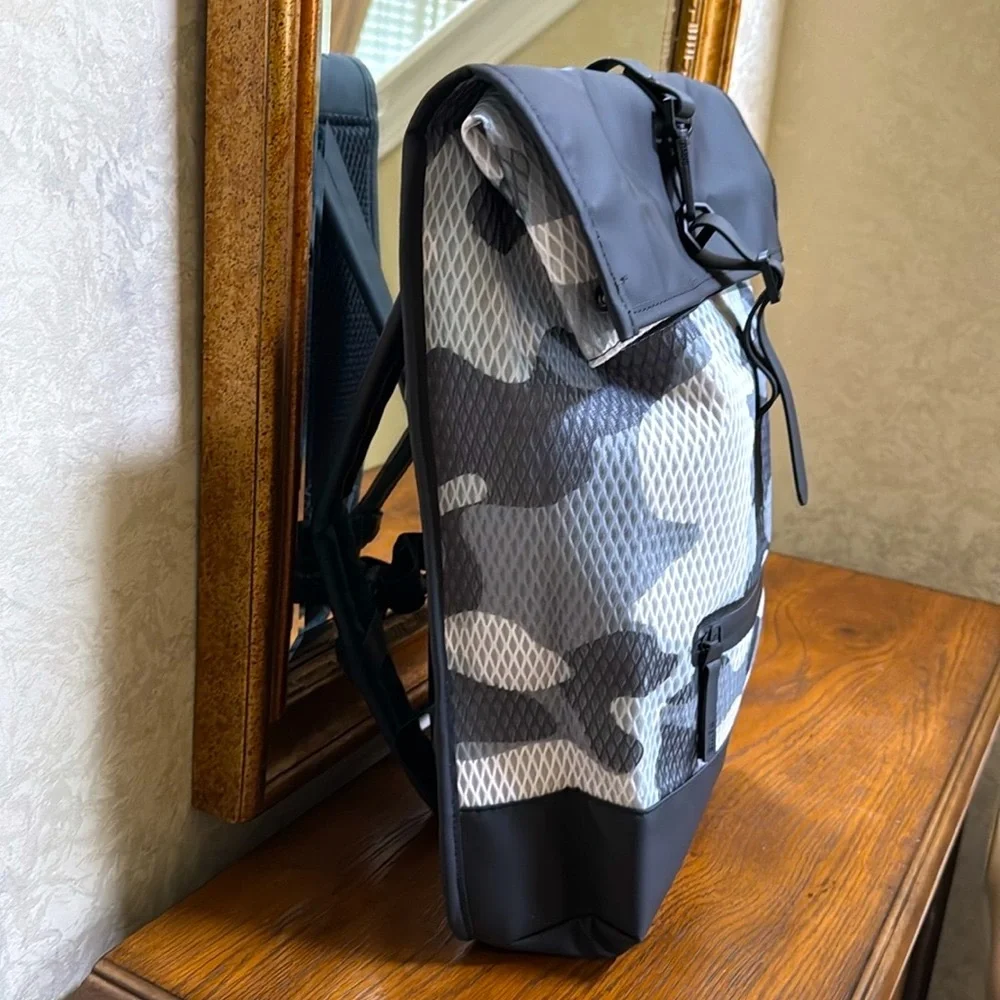 New Rains Black and Gray Unisex camo look Backpack.